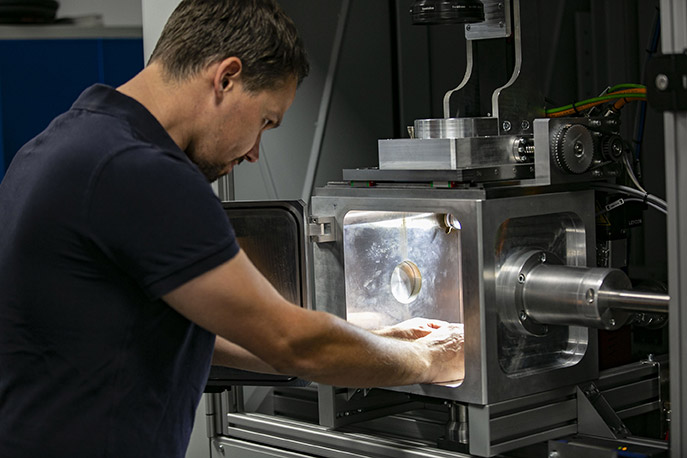 A LaVa-X employee works on a laser welding machine