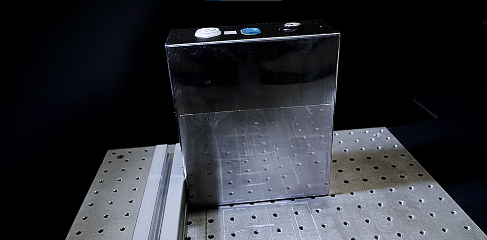 A prismatic cell envelope is laser cleaned with a pulsed fiber laser. Source Laserax A prismatic cell envelope is laser cleaned with a pulsed fiber laser. Source Laserax